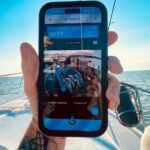AquaVue app showing live boat camera view and weather