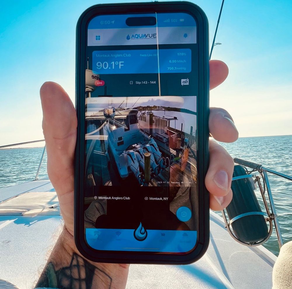 AquaVue app showing live boat camera view and weather